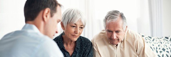 Older couple meet with an advisor to review their mortgage options